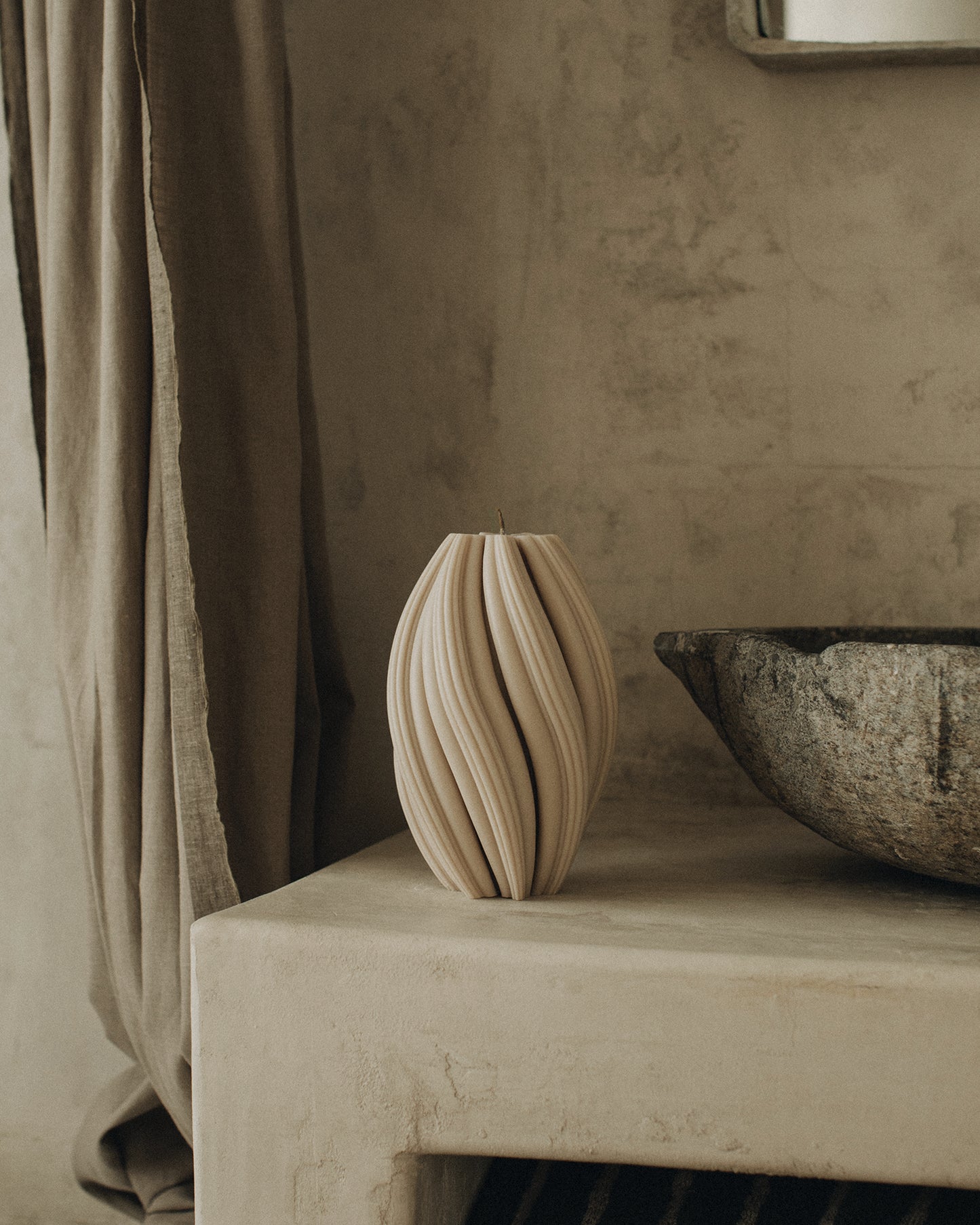 LAWA Candles Swirl Candle, large, in Moon Gray soy wax styled in a home decor setting, alternate angle