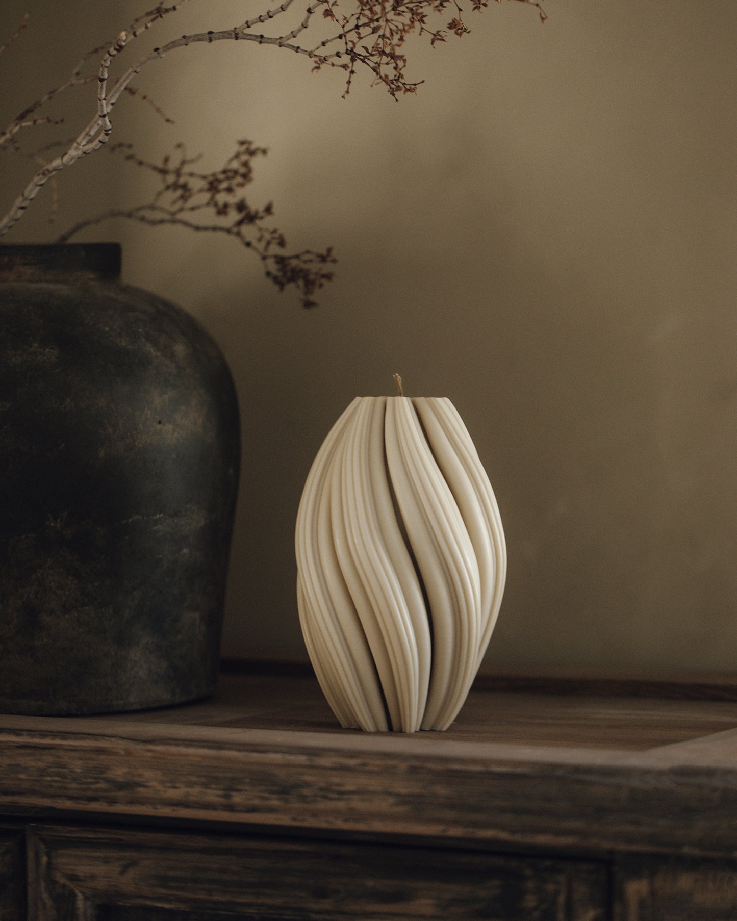LAWA Candles Swirl Candle, large, in Moon Gray soy wax styled in a home decor setting