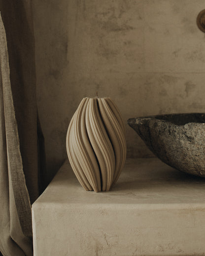 LAWA Candles Swirl Candle, large, in Olive Beige soy wax styled in a home decor setting, alternate angle