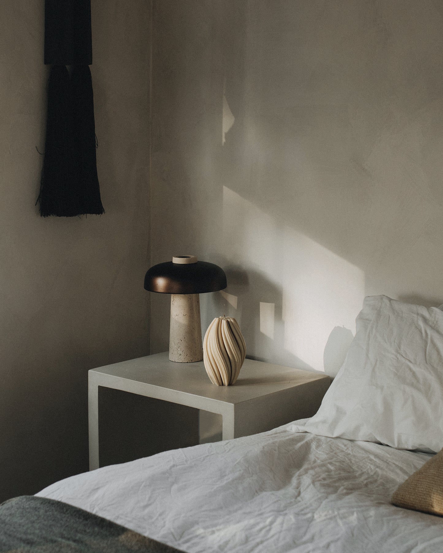 LAWA Candles Swirl Candle, large, in Sandstone soy wax styled in a home decor setting, alternate angle