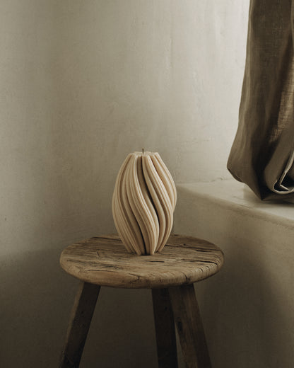 LAWA Candles Swirl Candle, large, in Sandstone soy wax styled in a home decor setting