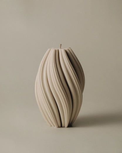 LAWA Candles Swirl Candle, large, in Sandstone soy wax featuring spiraling twisted ridges, product photo on a plain background