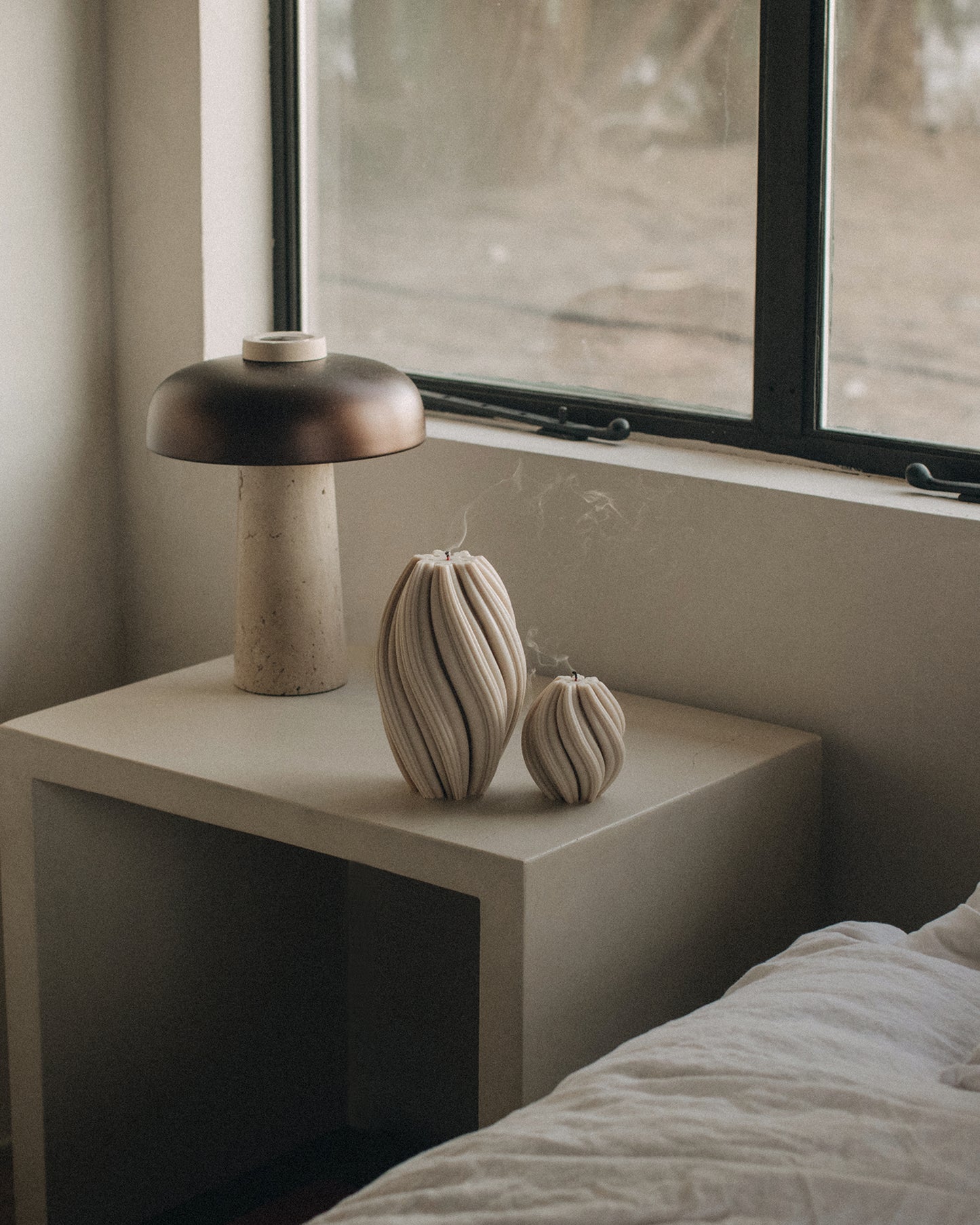 LAWA Candles Swirl Candle in Moon Gray soy wax, large and small sizes styled together in a home decor setting