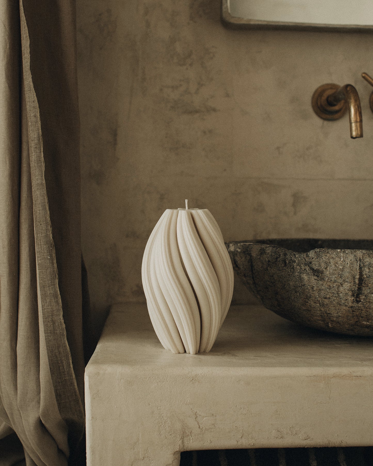 LAWA Candles Swirl Candle, large, in White soy wax styled in a home decor setting, alternate angle