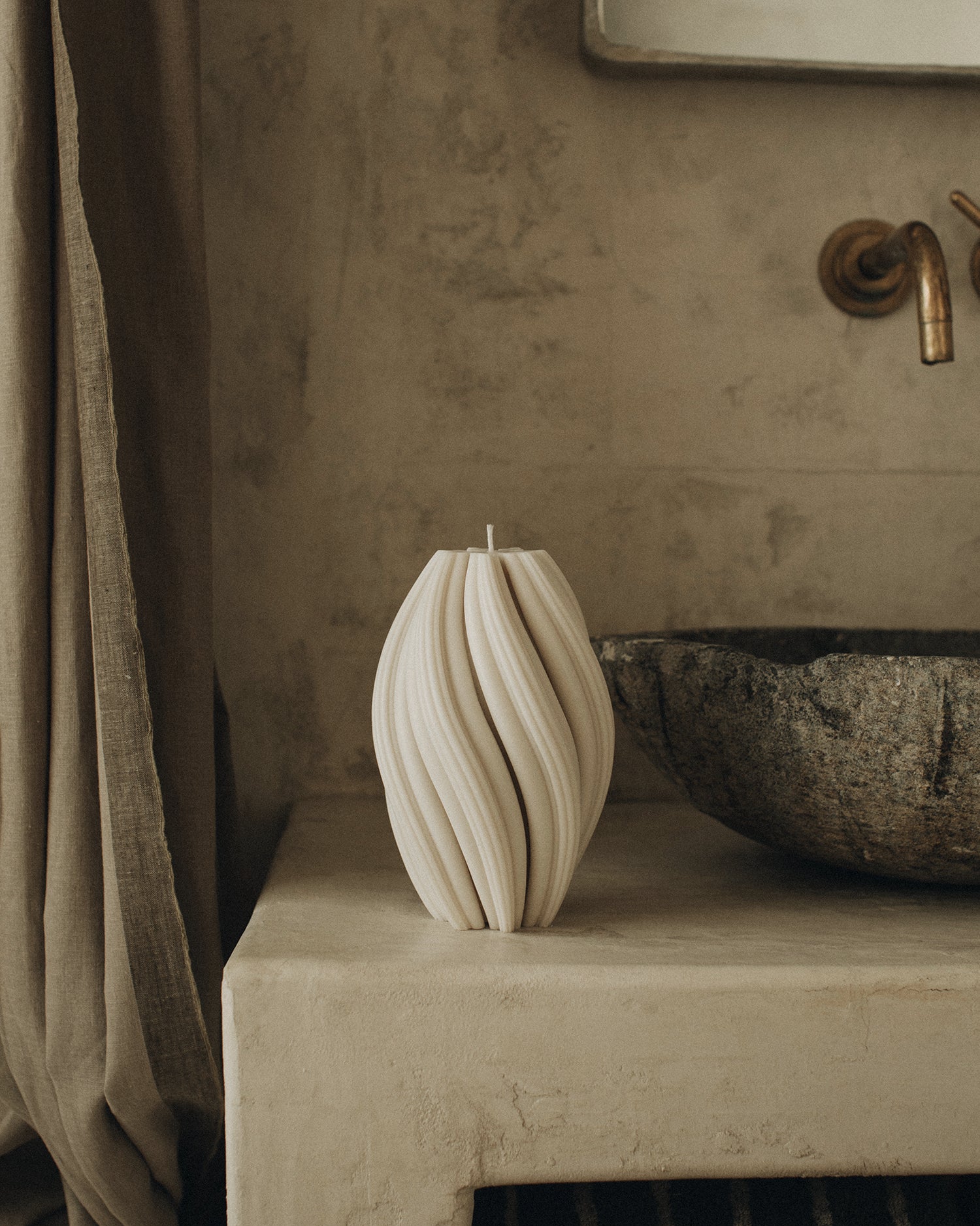 LAWA Candles Swirl Candle, large, in White soy wax styled in a home decor setting, alternate angle