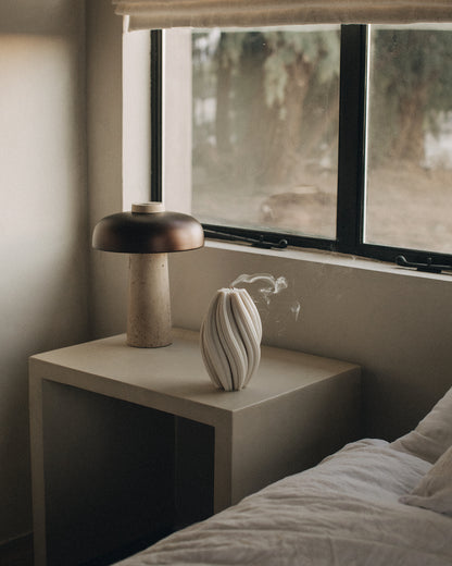 LAWA Candles Swirl Candle, large, in White soy wax styled in a home decor setting