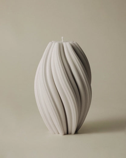 LAWA Candles Swirl Candle, large, in White soy wax featuring spiraling twisted ridges, product photo on a plain background