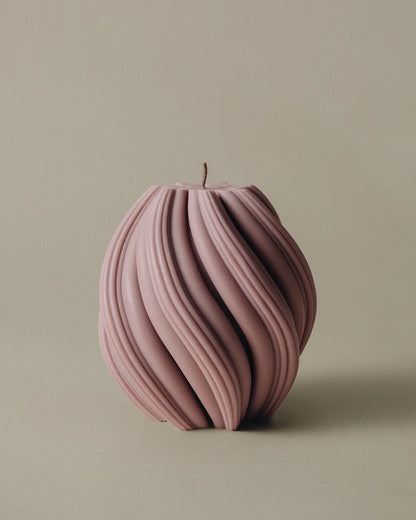 LAWA Candles Swirl Candle, medium, in Dusty Rose soy wax featuring spiraling twisted ridges, product photo on a plain background
