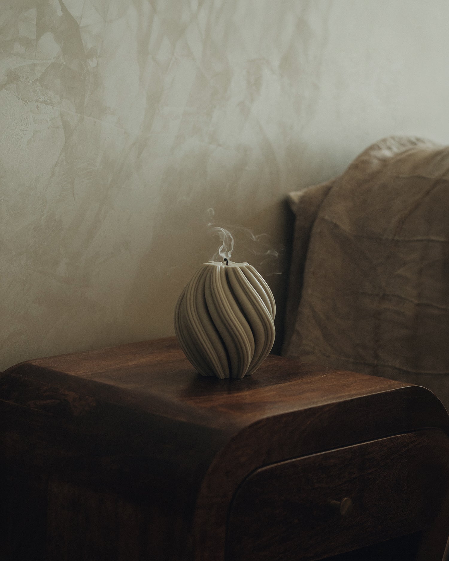 LAWA Candles Swirl Candle, medium, in Jade soy wax styled in a home decor setting