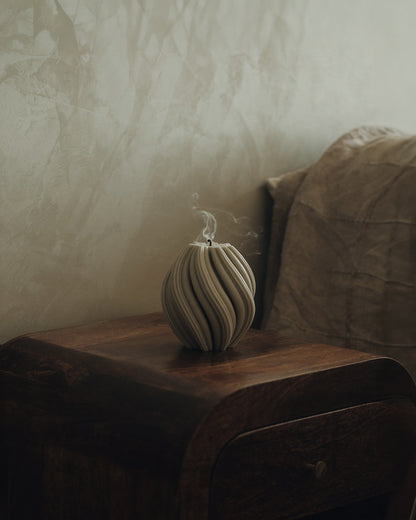 LAWA Candles Swirl Candle, medium, in Jade soy wax styled in a home decor setting