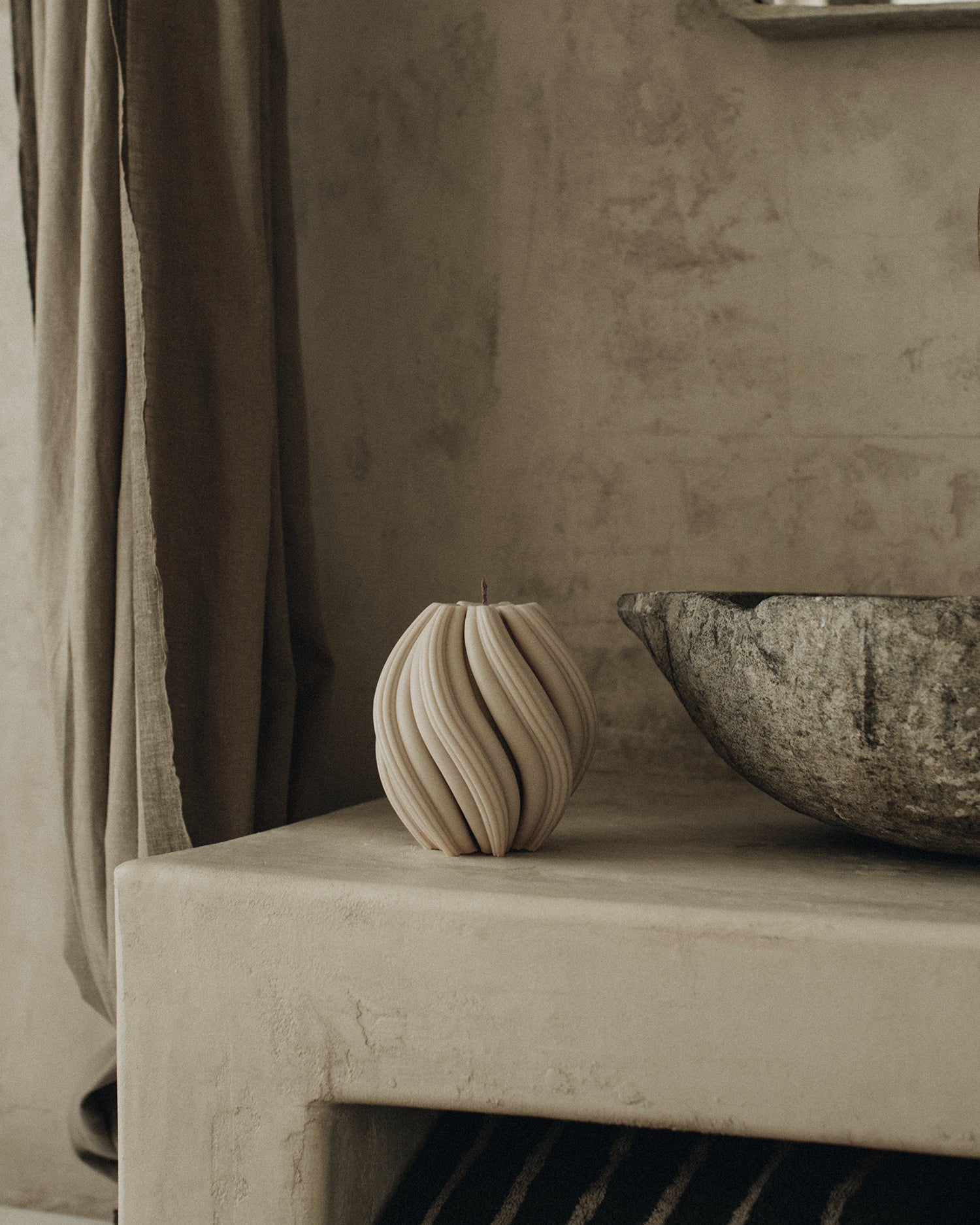 LAWA Candles Swirl Candle, medium, in Moon Gray soy wax styled in a home decor setting, alternate angle