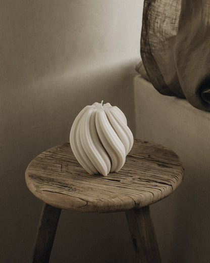 LAWA Candles Swirl Candle, medium, in White soy wax styled in a home decor setting