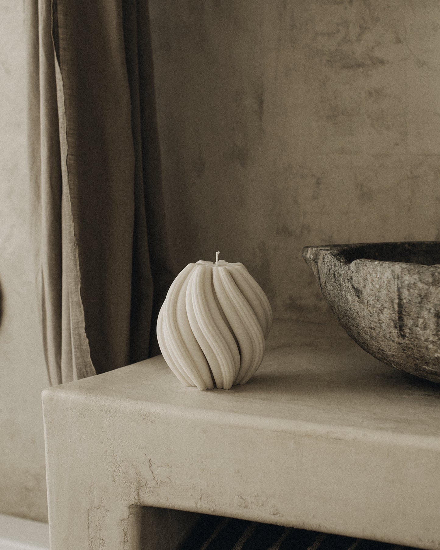 LAWA Candles Swirl Candle, medium, in White soy wax styled in a home decor setting, alternate angle