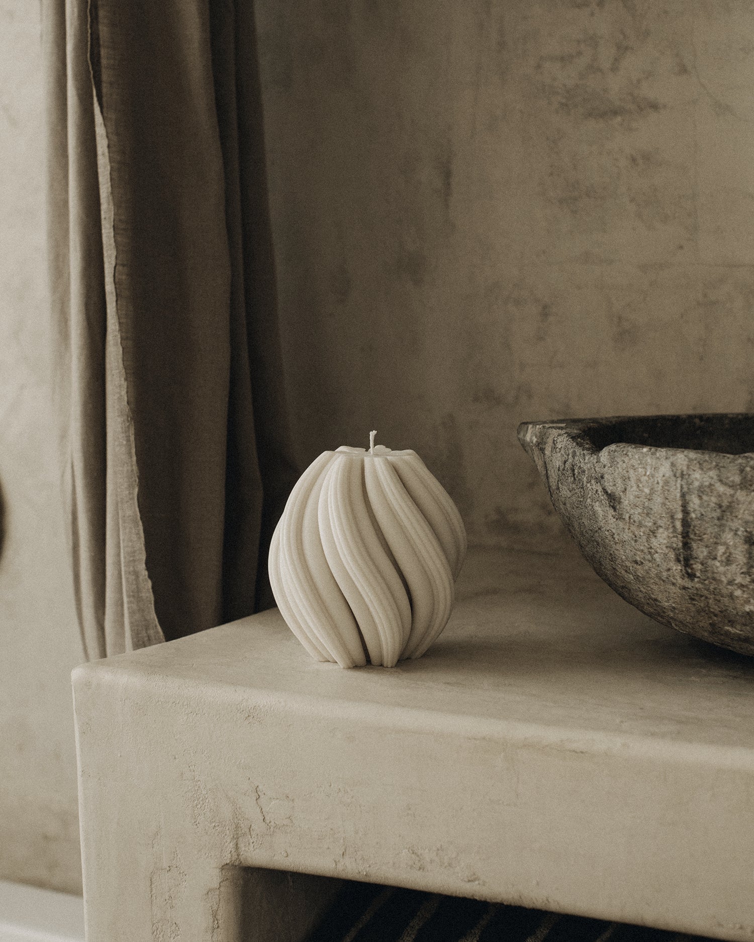 LAWA Candles Swirl Candle, medium, in White soy wax styled in a home decor setting, alternate angle
