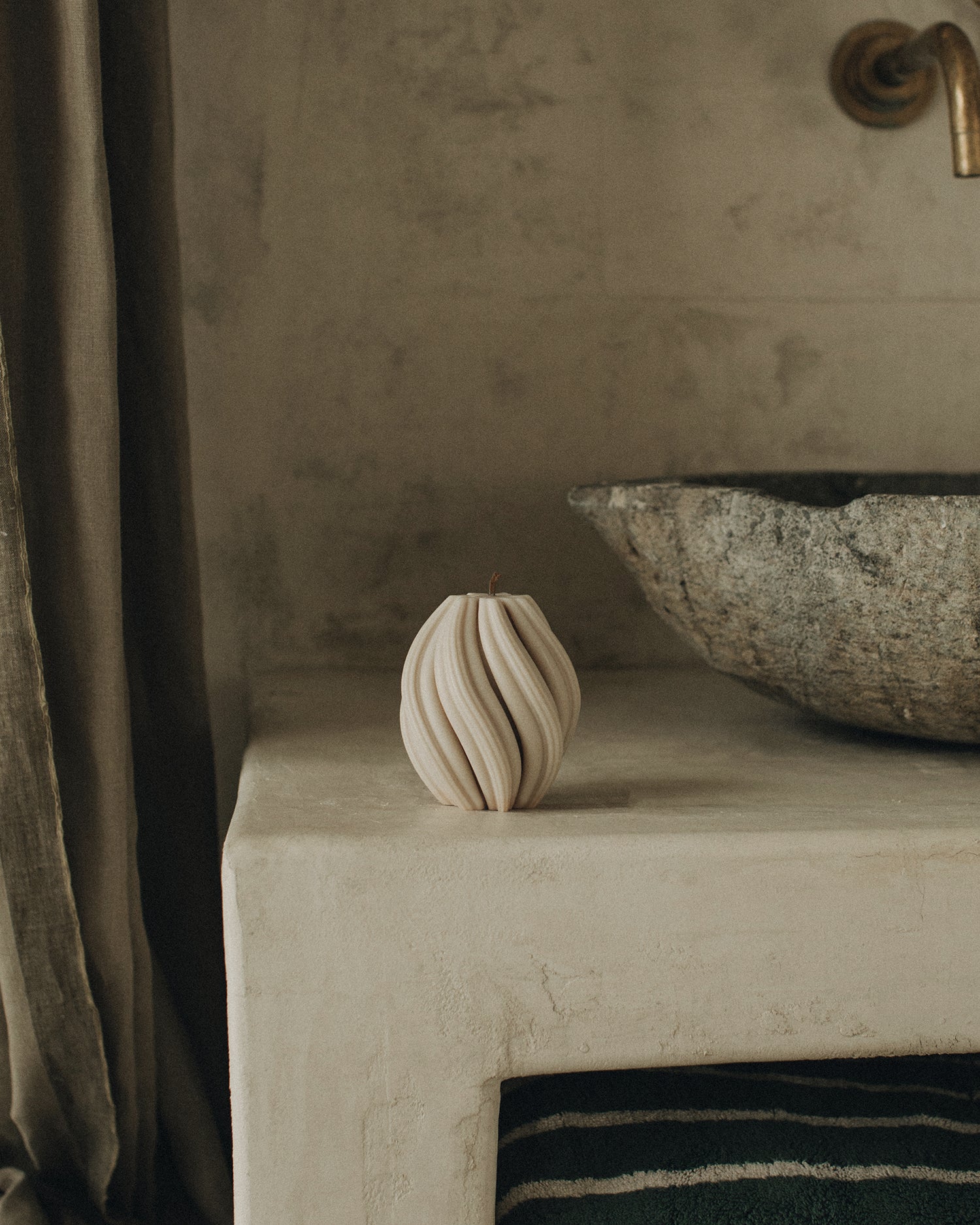 LAWA Candles Swirl Candle, small, in Moon Gray soy wax styled in a home decor setting