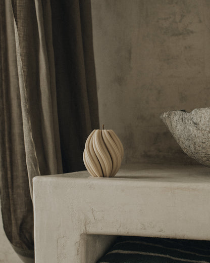 LAWA Candles Swirl Candle, small, in Sandstone soy wax styled in a home decor setting