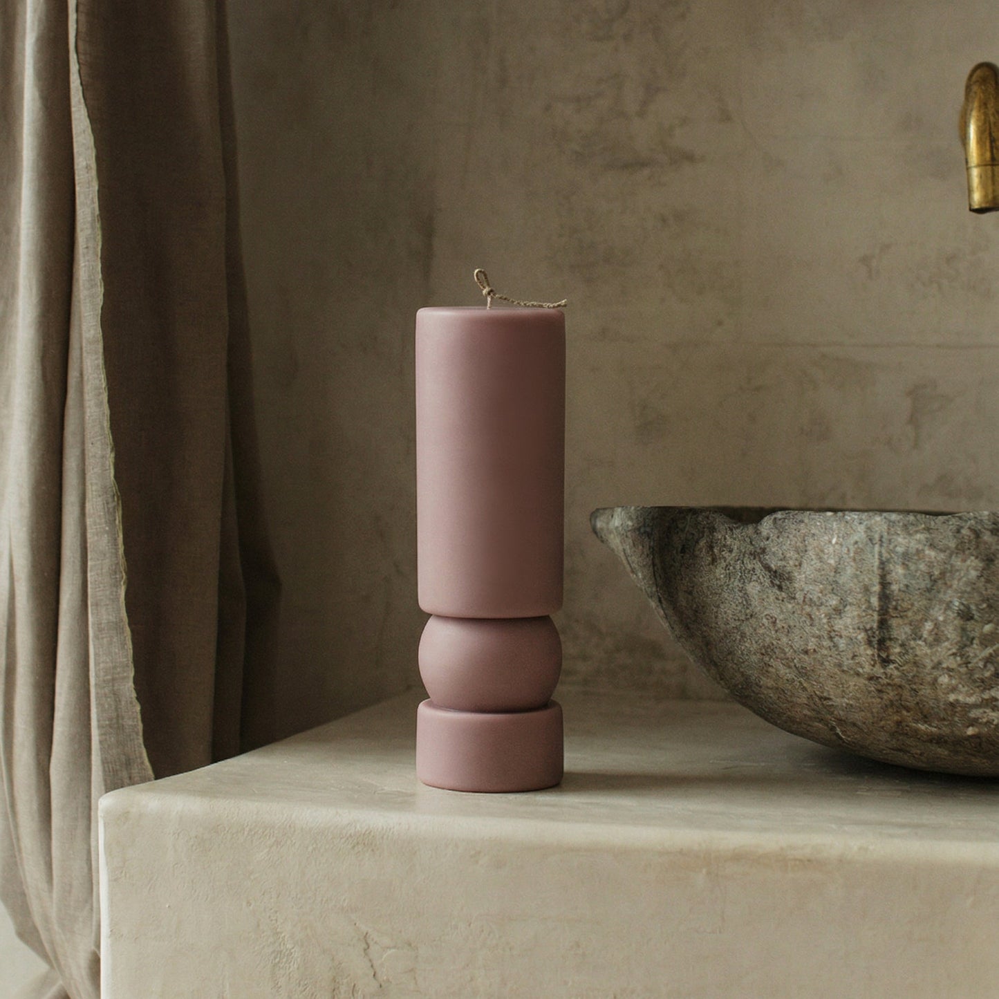 Close-up detail of handmade Zen sculptural candle showing smooth soy wax texture and natural cotton wick
