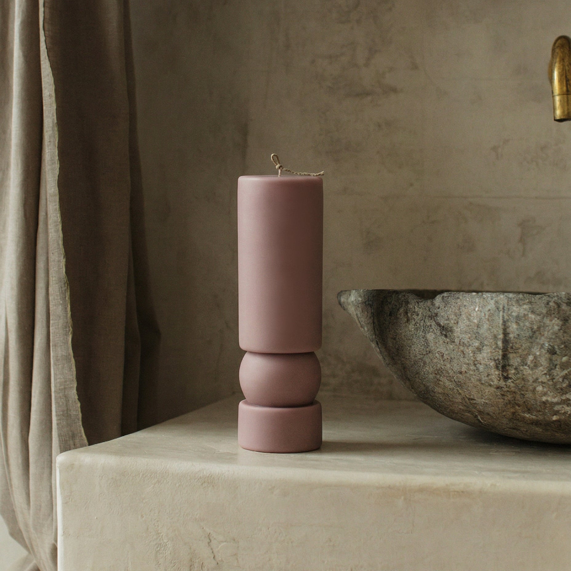 Close-up detail of handmade Zen sculptural candle showing smooth soy wax texture and natural cotton wick