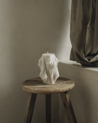 LAWA Candles Cascading Wave Candle, large, in White soy wax styled in a home decor setting