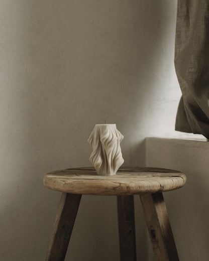LAWA Candles Cascading Wave Candle, small, in Moon Gray soy wax styled in a home decor setting