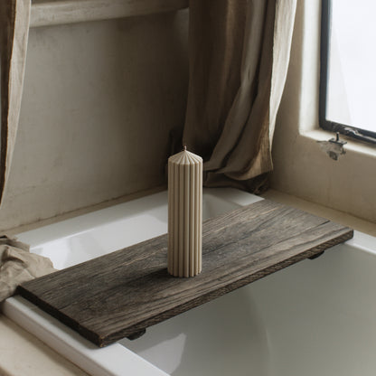 Close-up detail of handmade Peak sculptural candle showing smooth soy wax texture and natural cotton wick