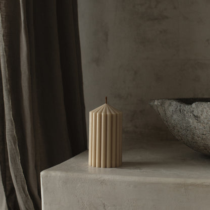Close-up detail of handmade Peak sculptural candle showing premium soy wax texture in natural light