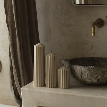 Close-up detail of handmade Peak sculptural candle showing premium soy wax texture and cotton wick