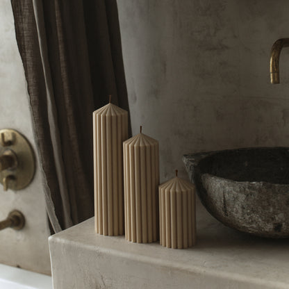 Close-up detail of handmade Peak sculptural candle showing smooth soy wax texture and cotton wick from Los Angeles