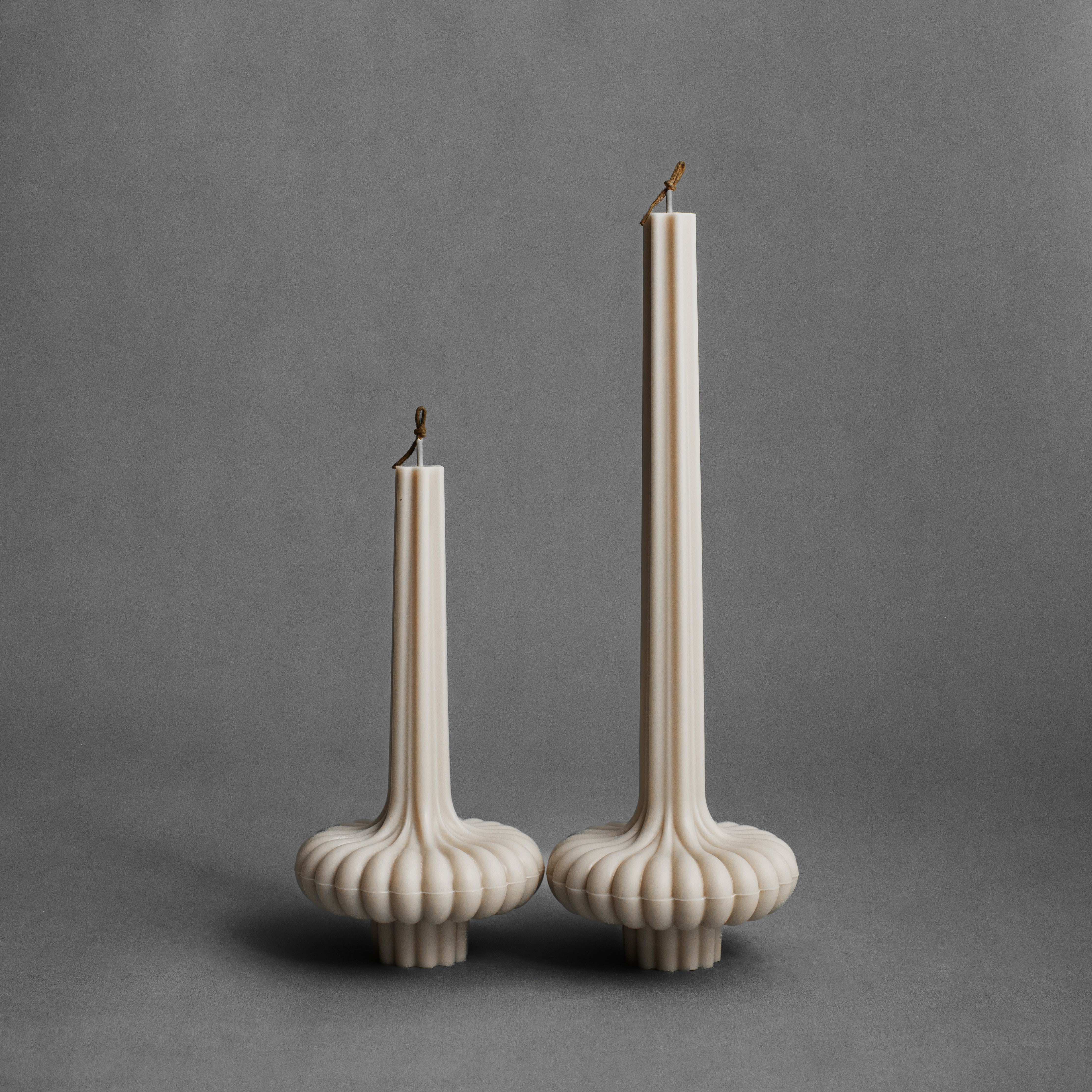 Moon gray pumpkin base pillar candle by LAWA with a sculptural rounded form