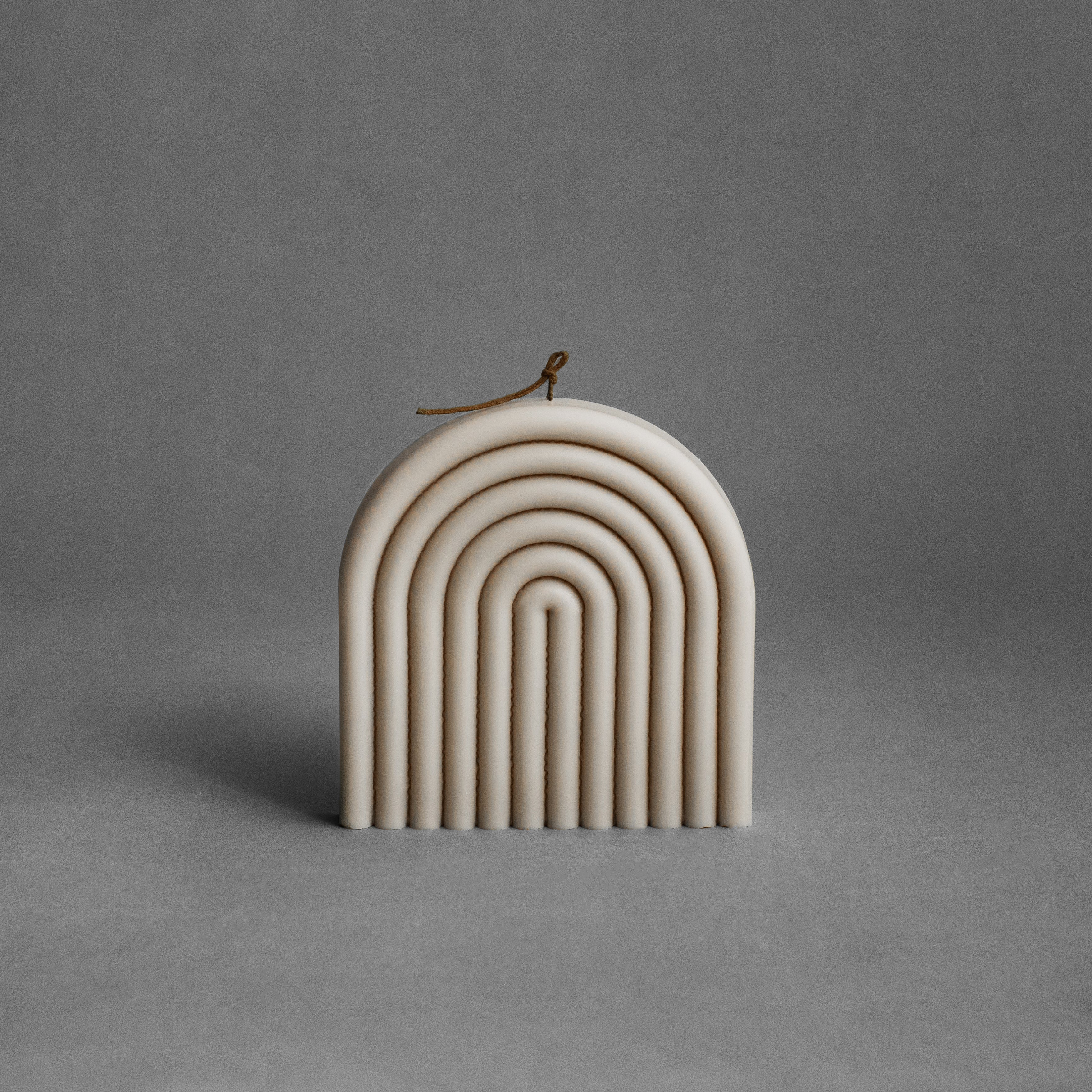 Moon gray rainbow pillar candle by LAWA with modern arched silhouette