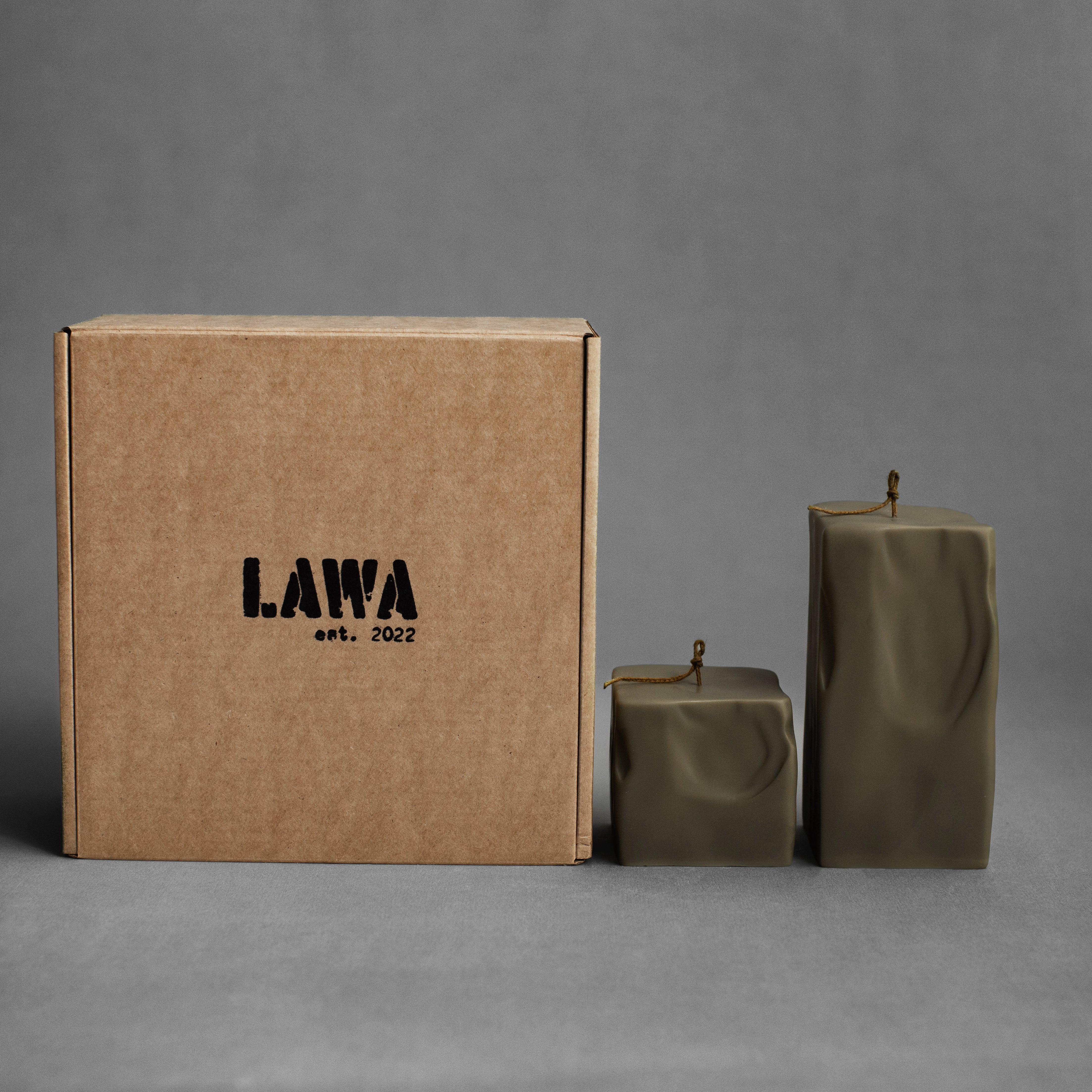 Earthy green raw block pillar candle set by LAWA, sculptural geometric soy wax candles for minimal home decor with packaging box