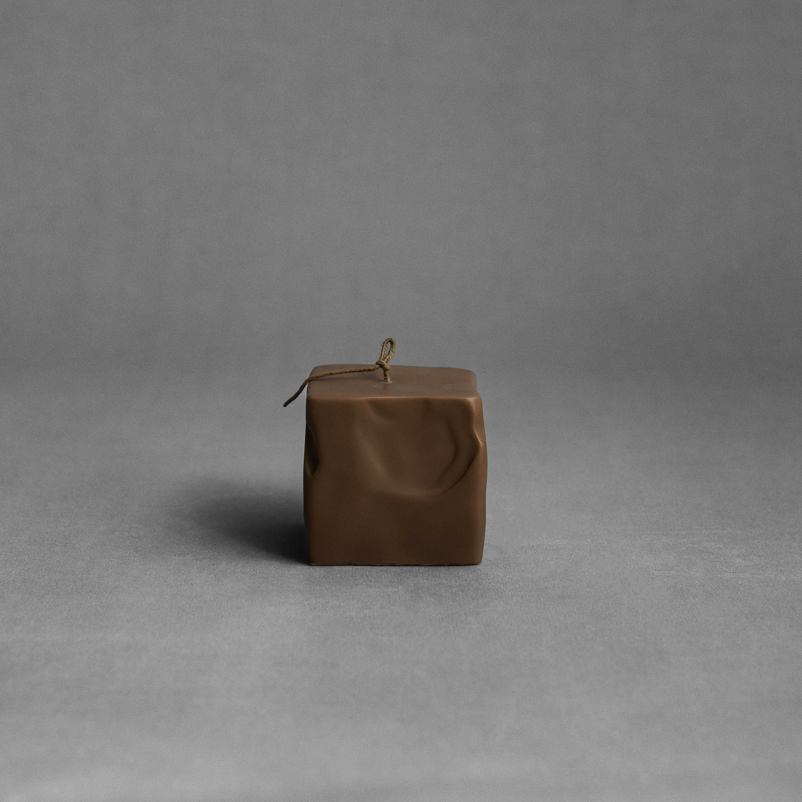 Small kobicha brown raw block soy wax candle by LAWA featuring a clean geometric natural form