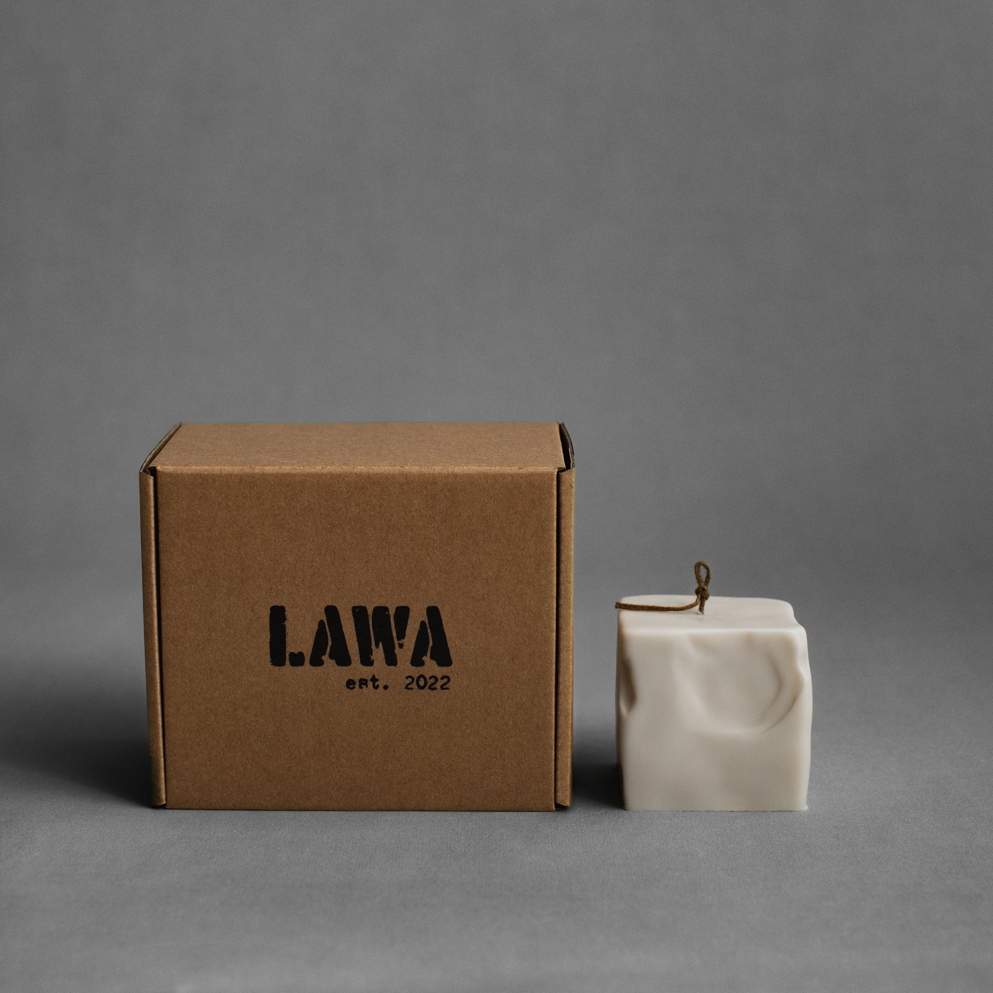 Small light beige raw block soy wax pillar candle by LAWA with minimalist geometric shape for modern decor perfect housewarming gift for family and friends