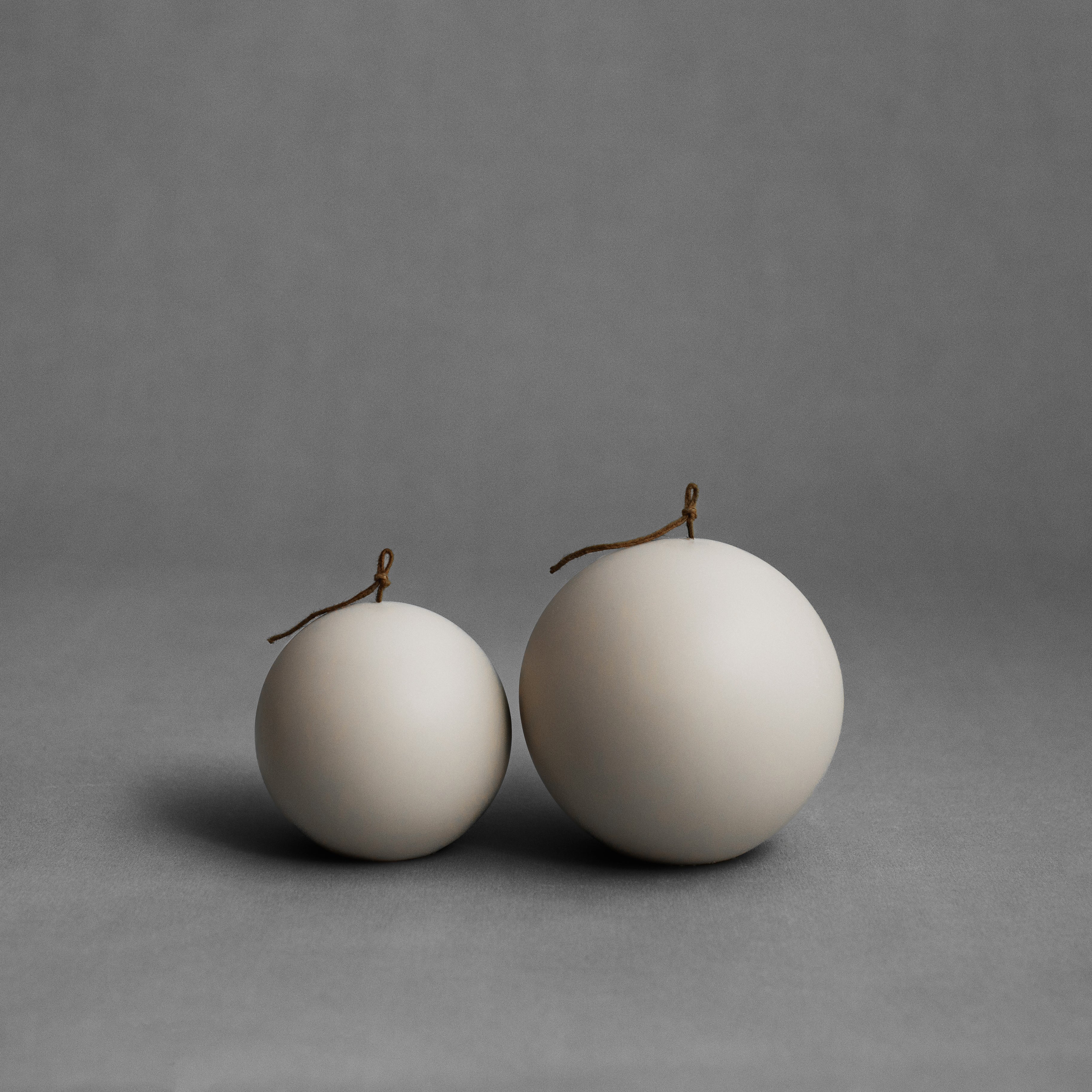 Light beige sphere pillar candle set by LAWA featuring rounded sculptural soy wax shapes for minimalist decor