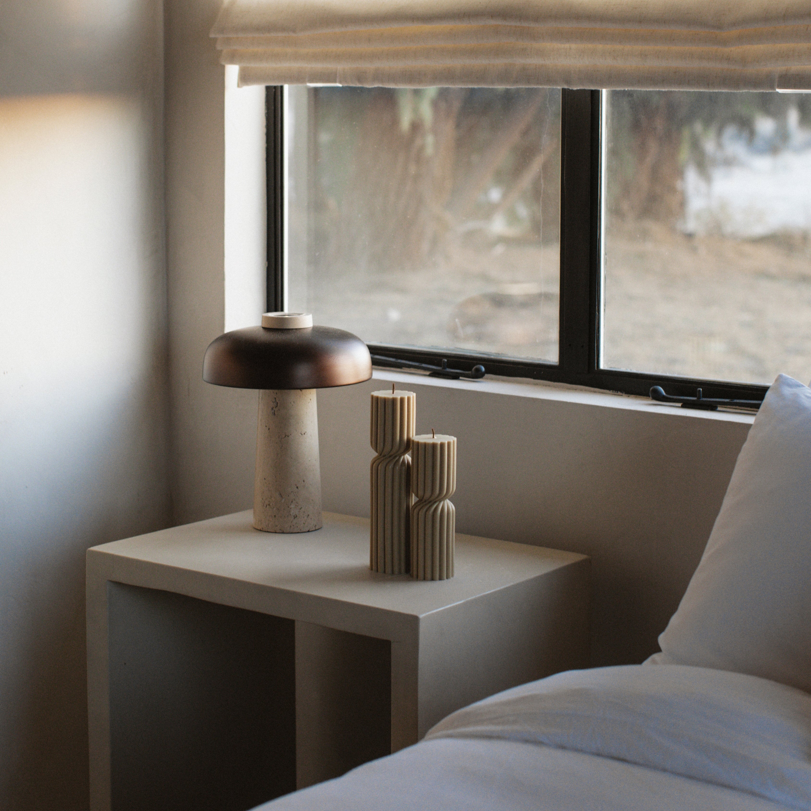 LAWA olive beige spiral spire candles in soy wax featuring organic swirling texture