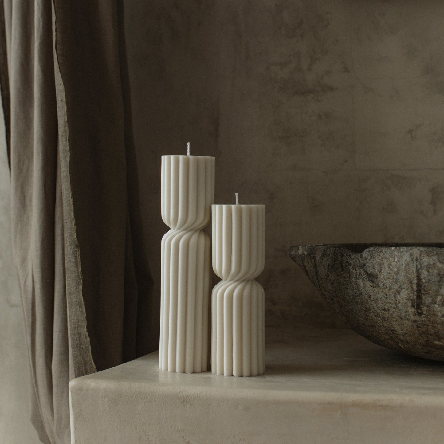 Close-up detail of handmade Spiral Spire sculptural candle showing premium soy wax texture and cotton wick