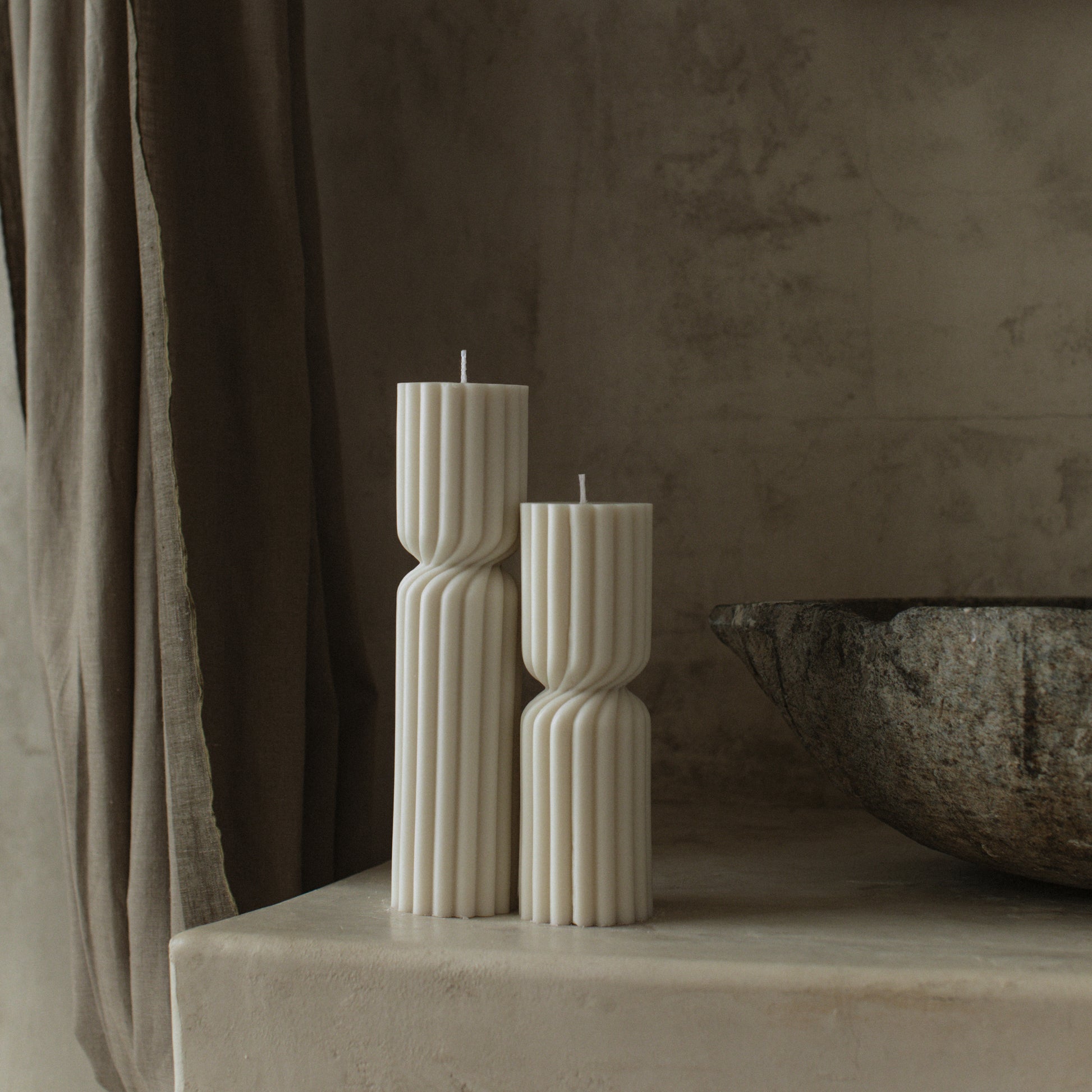 Close-up detail of handmade Spiral Spire sculptural candle showing premium soy wax texture and cotton wick