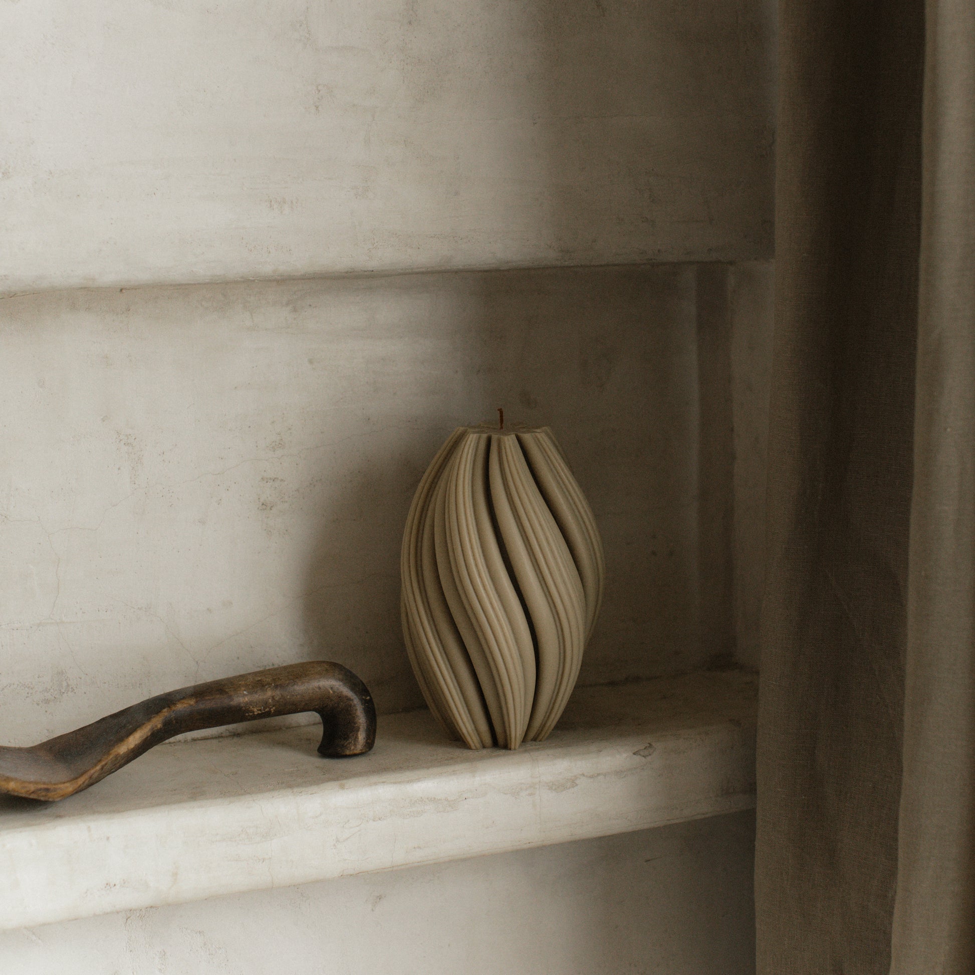 Handmade sculptural swirl candle detail showing premium soy wax texture and organic curves from Los Angeles