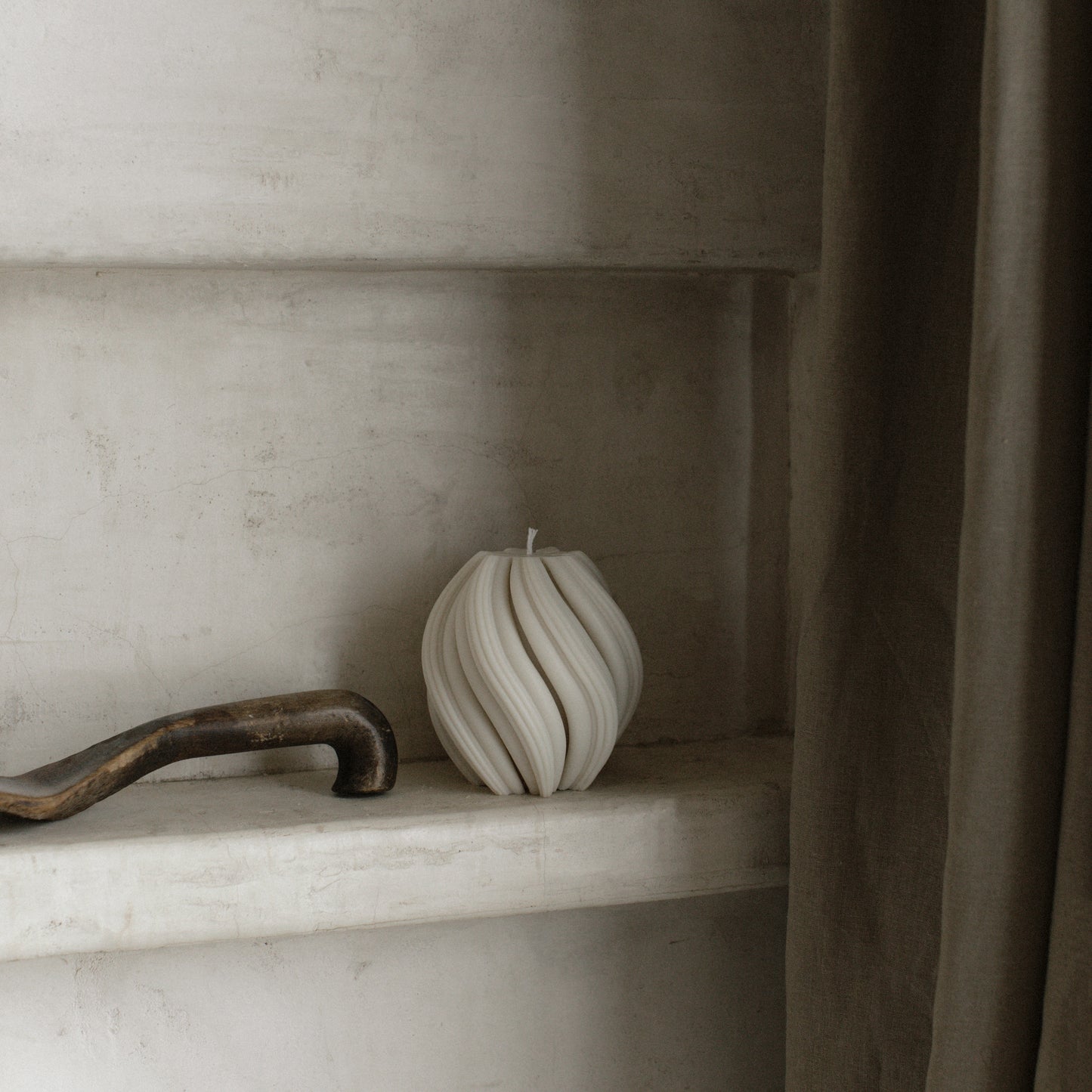 Handmade swirl sculptural candle detail showing premium soy wax texture in natural light