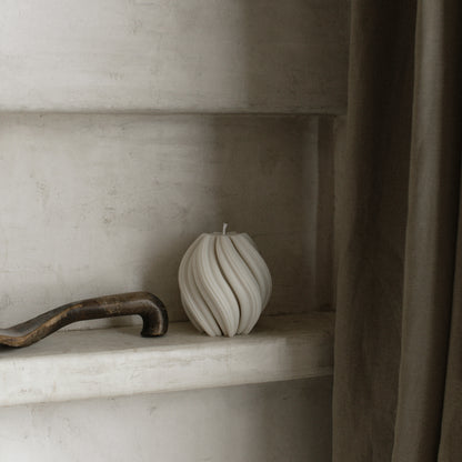 Handmade swirl sculptural candle detail showing premium soy wax texture in natural light
