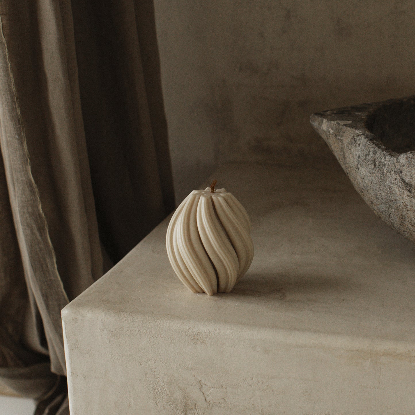 Handmade sculptural swirl candle detail showing premium soy wax texture and elegant curves in Los Angeles studio