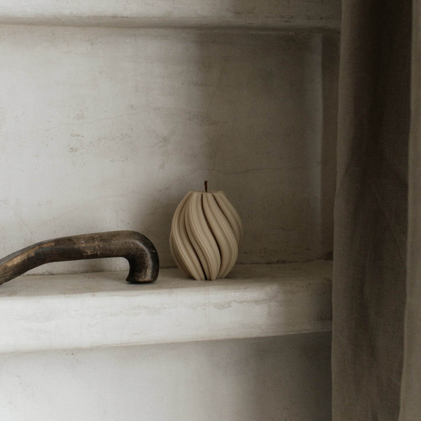 Handmade unscented soy wax swirl sculptural candle detail showing organic curved texture and artisan craftsmanship