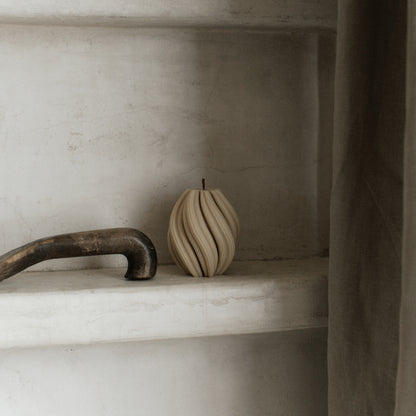 Handmade unscented soy wax swirl sculptural candle detail showing organic curved texture and artisan craftsmanship