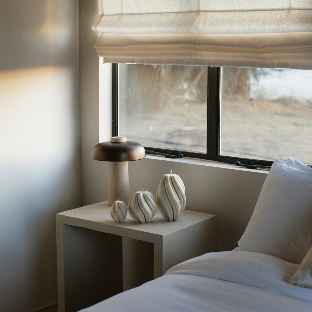 LAWA white swirl candle trio featuring elegant spiral sculptural textures