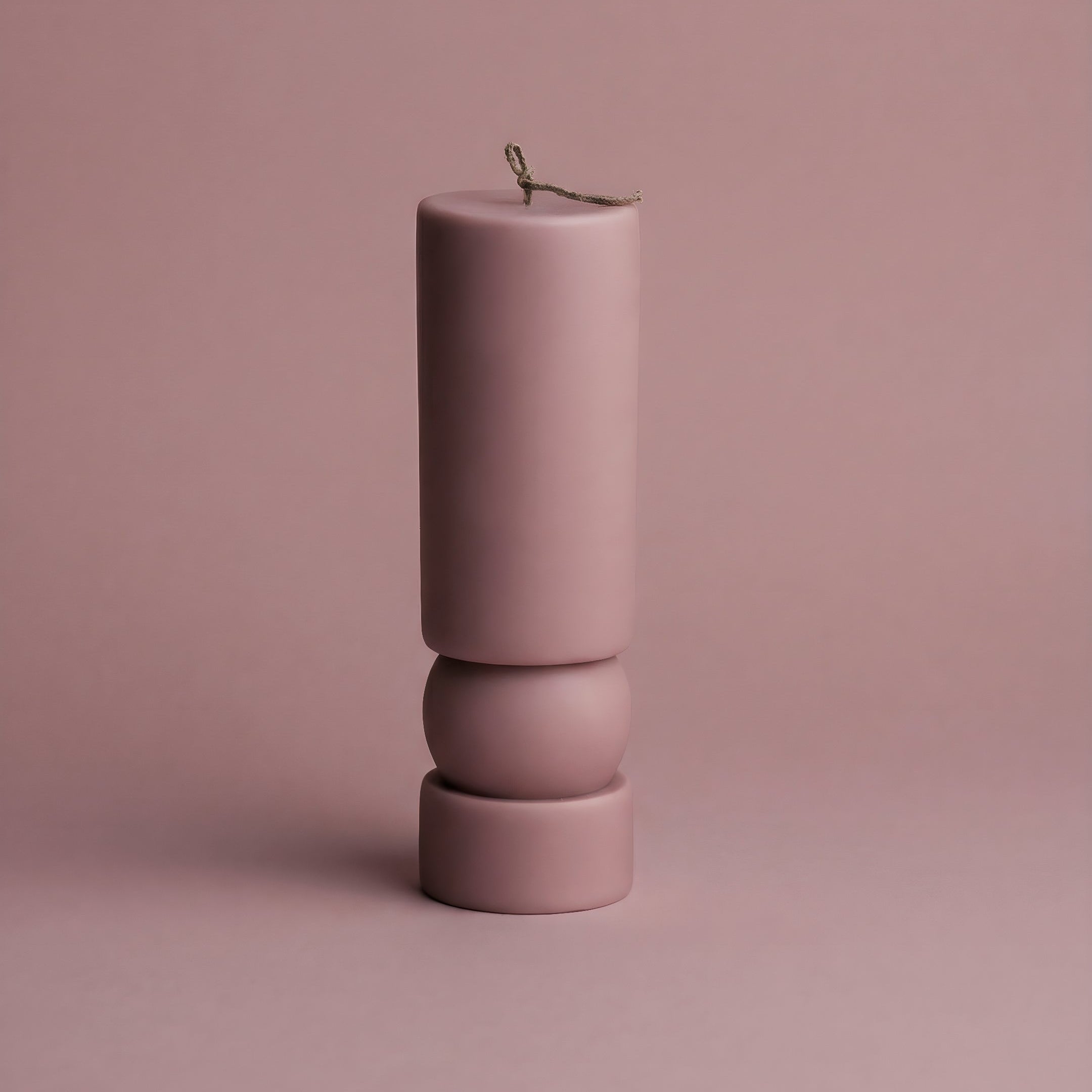 Close-up detail of handmade Zen sculptural candle showing smooth soy wax texture and natural cotton wick
