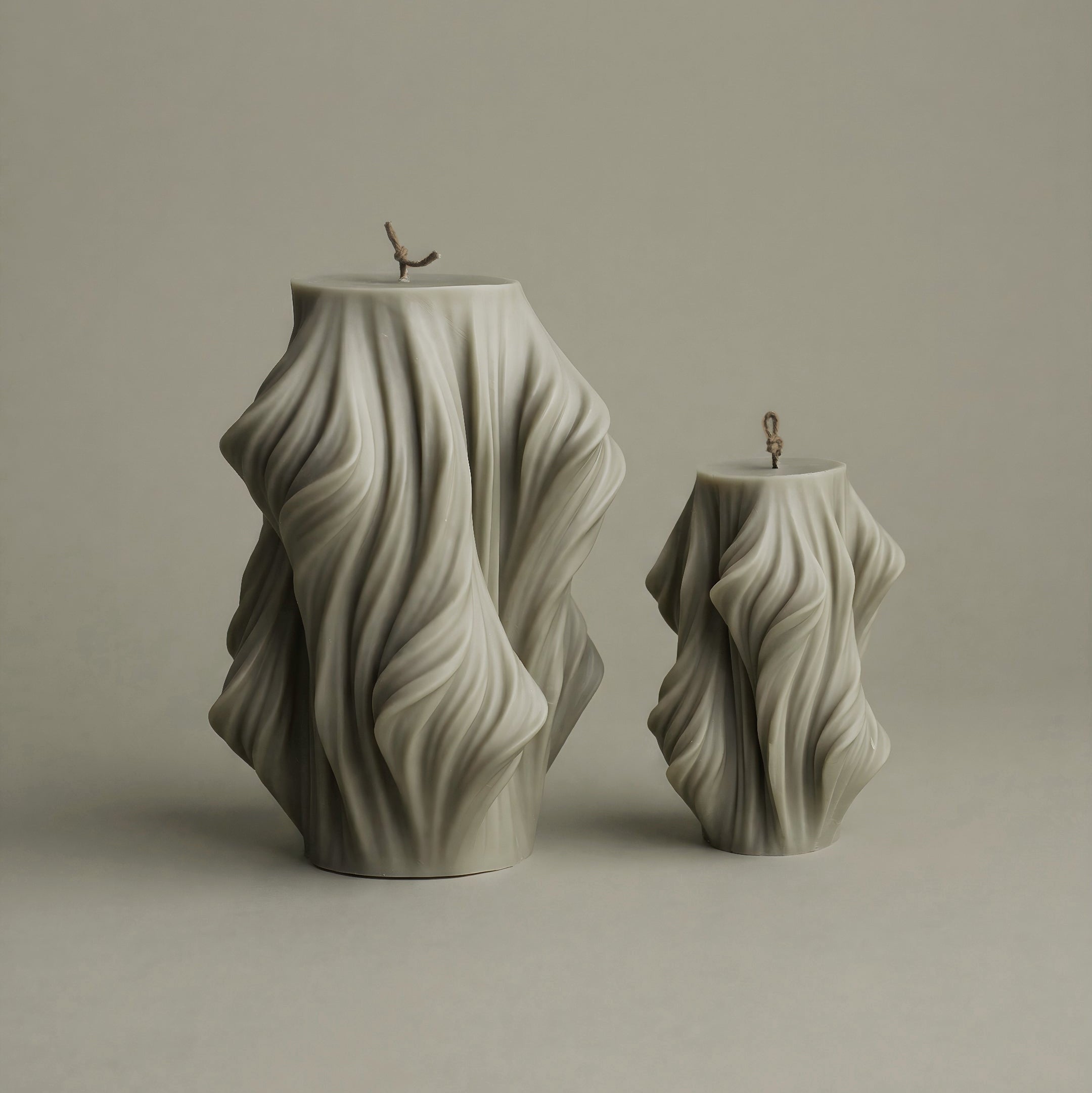Close-up detail of handmade Cascading Wave sculptural candle showing layered texture in premium soy wax