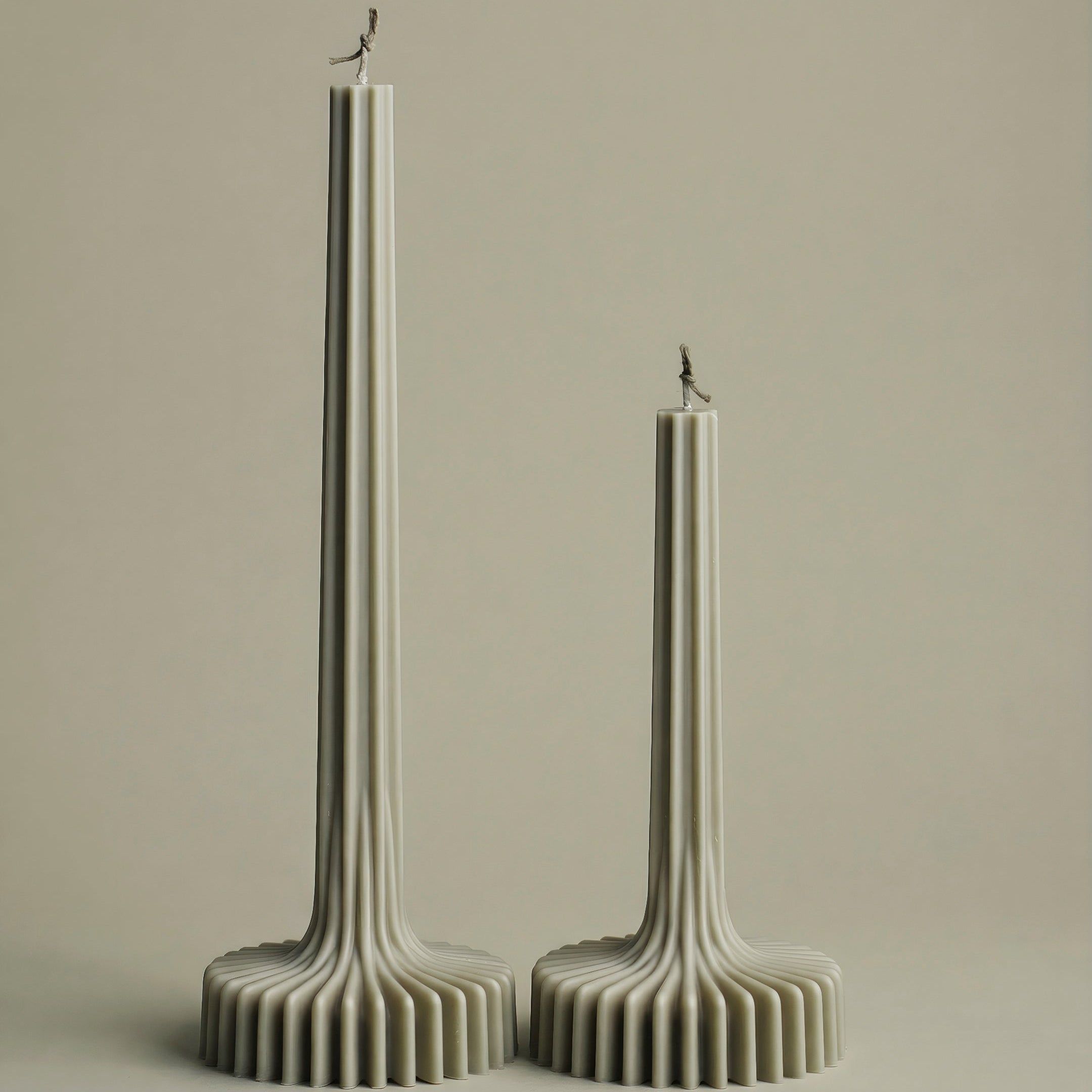 Close-up detail of handmade sculptural vase candle showing premium soy wax texture and cotton wick