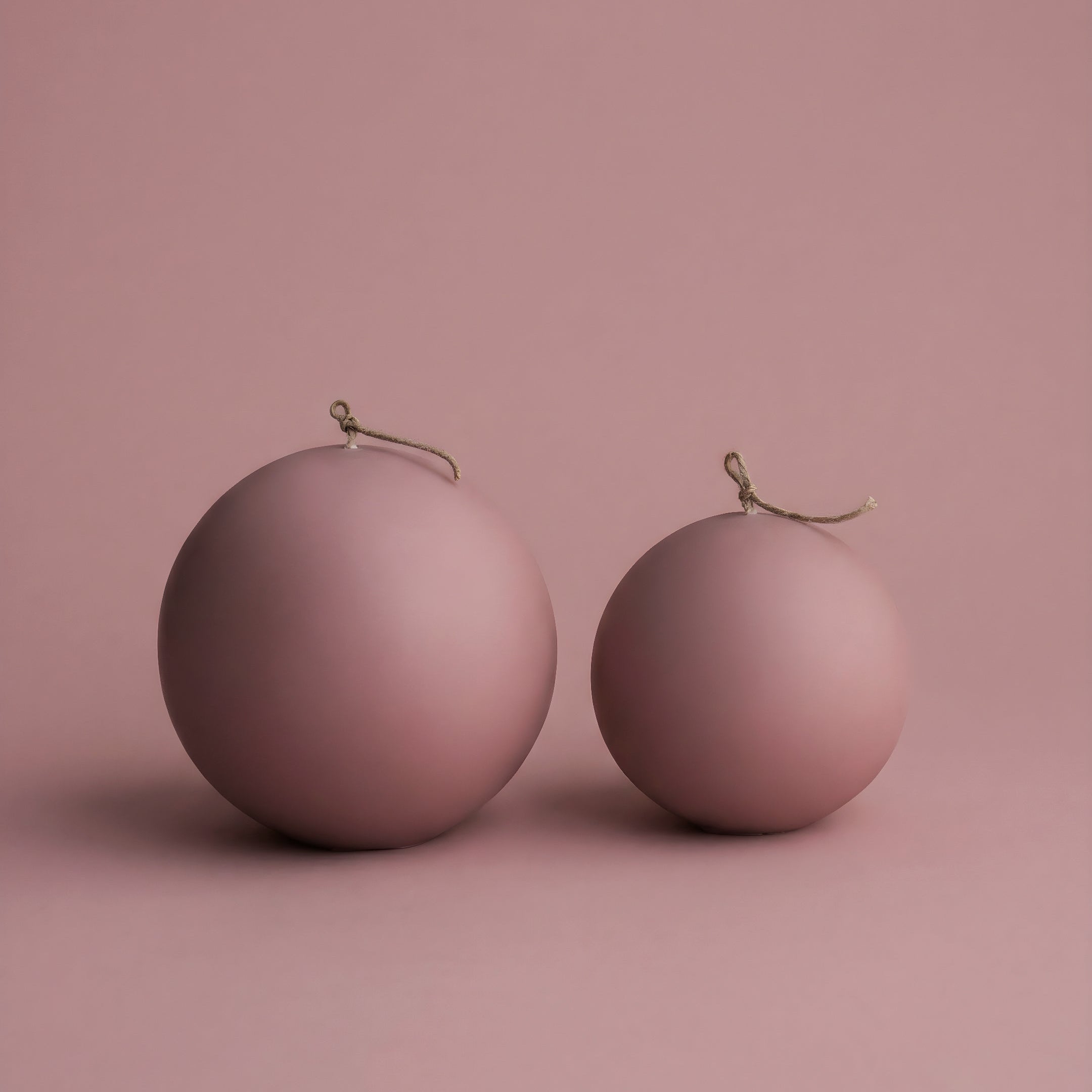 Handmade sphere candle in premium soy wax displayed in minimalist Los Angeles home setting with natural light