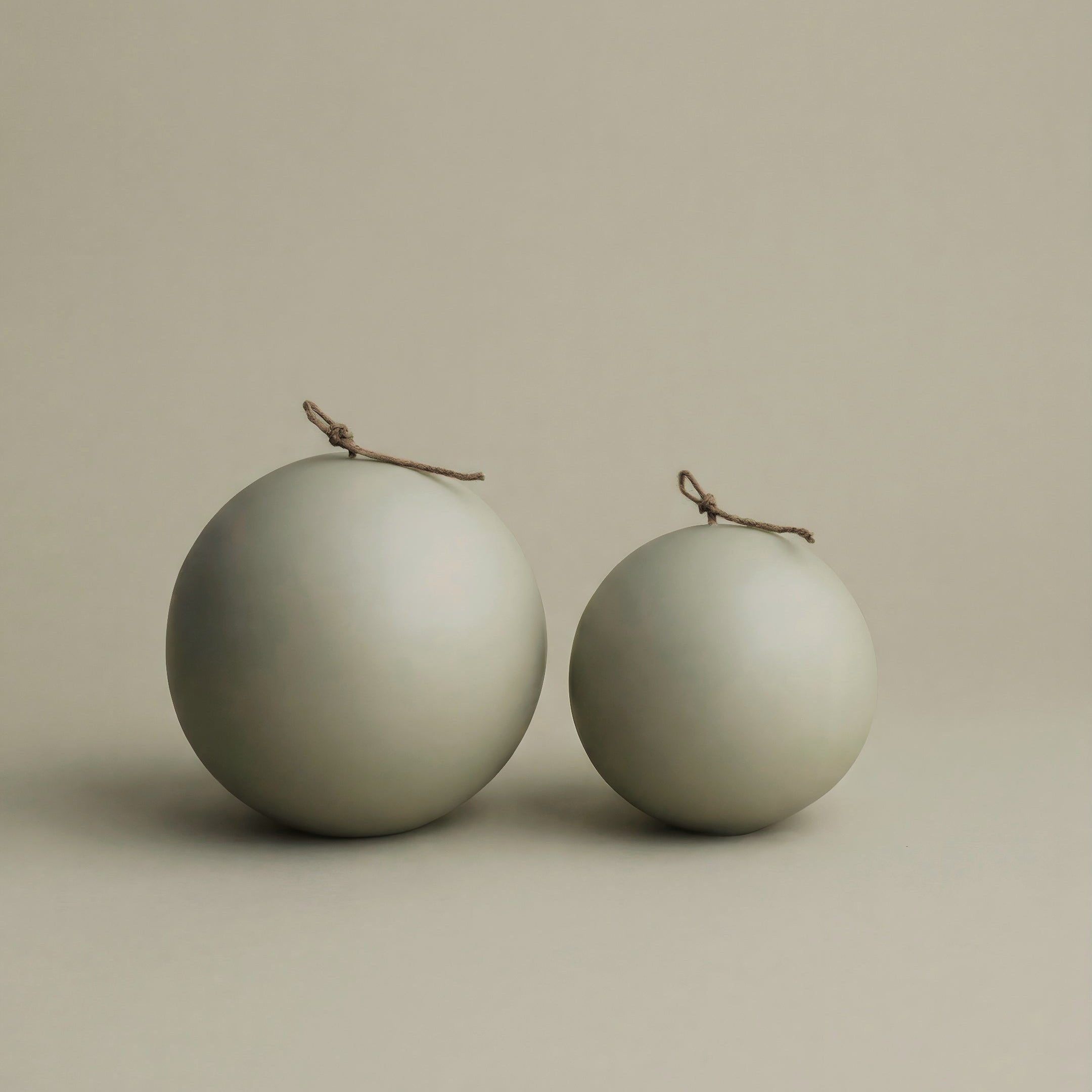 Close-up detail of handmade sphere candle showing smooth soy wax texture and cotton wick in Los Angeles studio