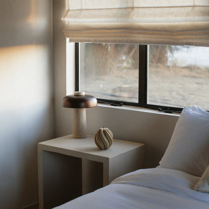Handmade sculptural swirl candle detail showcasing premium soy wax texture in Los Angeles studio setting